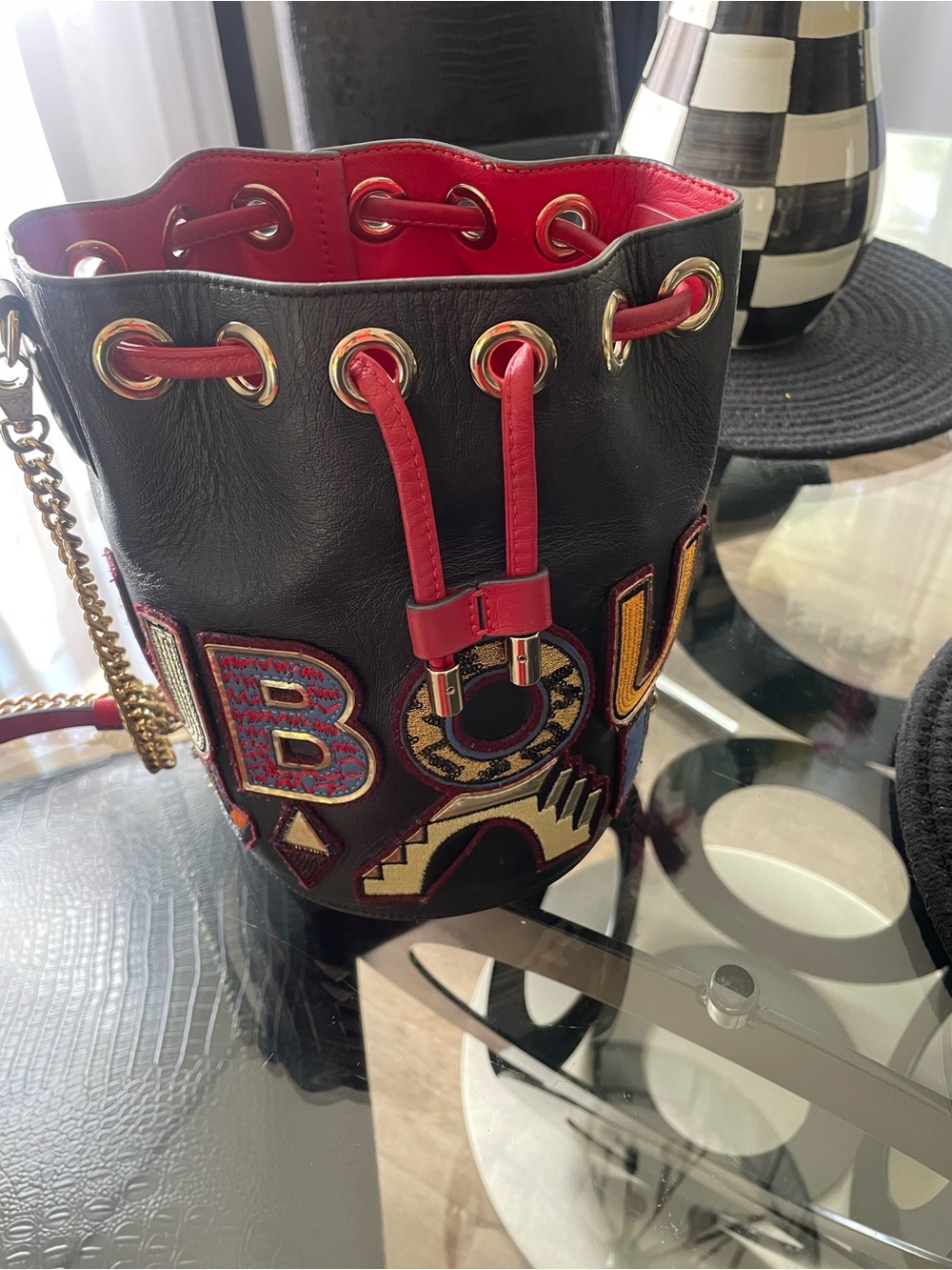 Christian Louboutin Black Leather Bucket Bag with Red Interior and Gold Hardware